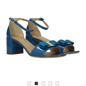 Like new  Salvatore Ferragamo blue bow sandals.
